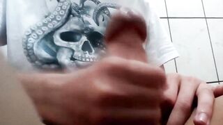 Twink jerks off until he gushes thick cum all over his tiny body