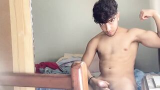 Fit British jock strokes his thick uncut cock until his balls explode