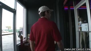 Tucker Scott deepthroats Lance Howard’s fat cock in glory hole raw sucking