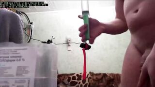 Solo guy gets Foley catheter shoved up his urethra while jerking off