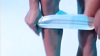 Muscle raider pops out his swollen bulge under jock revealing raw big dick gay solo action