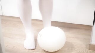 Tight white socks stomp balloon till his cock bursts cum splatter