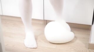 Tight white socks stomp balloon till his cock bursts cum splatter