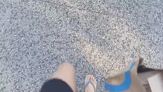 Twink in gray flip flops short shorts wanks his cock outdoors alone