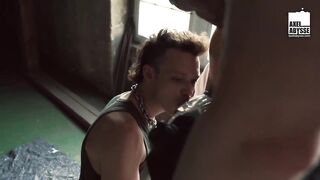 Axel Abysse takes Lucio Davoli’s thick cock in throat in brutal threesome gangbang with chains