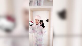 Femboy strips naked in front of the mirror teasing his smooth twink body