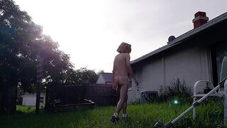 Thonged twink jerks off outside his ass drips on the grass