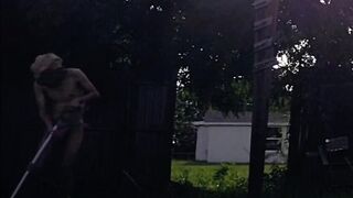 Thonged twink jerks off outside his ass drips on the grass