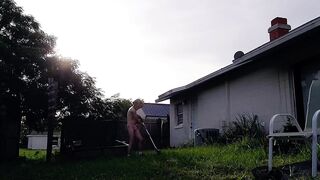 Thonged twink jerks off outside his ass drips on the grass