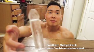 Horny Asian Twink deep throats his toy while flexing raw muscle