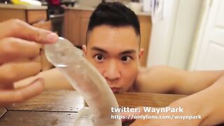 Horny Asian Twink deep throats his toy while flexing raw muscle