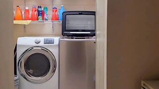 Twink undresses while cleaning teased with thong barely hiding