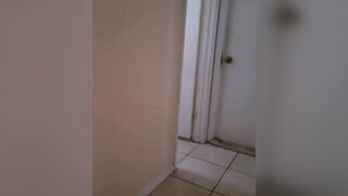 Twink undresses while cleaning teased with thong barely hiding
