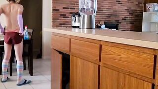 Twink undresses while cleaning teased with thong barely hiding