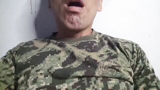 Military stud pumps his thick cock and blows his load on camera