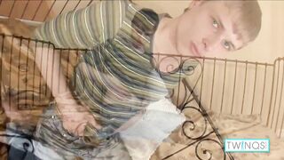 Blonde twink Bobby N strokes his big dick then cums all over his tight hole