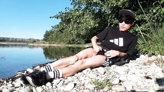 Gay twink jerks off on cumbeach then real snake slithers over his sticky thighs
