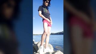 Twink boy in glasses cap sneakers pisses long dark hair down the river summer gay nature outdoor piss solo