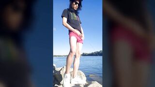 Twink boy in glasses cap sneakers pisses long dark hair down the river summer gay nature outdoor piss solo