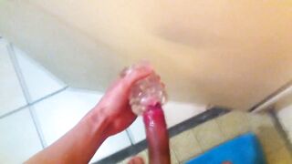 Twink shaved cock wrecked by lubed fleshlight deep throat cumshot on bathroom door