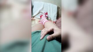 Gay femboy in thigh highs jerks off to a cumshot he found on his phone
