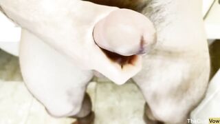 Standing hairy twink wanks till cum explodes thick in close-up leg shot