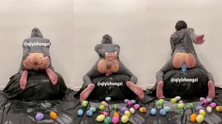 Asian twink gets squirted with cum while getting spanked and laying egg