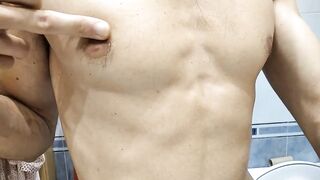Moaning European guy pinches nipples while jerking his big BBC sissy training cock