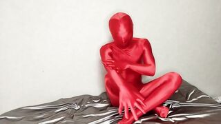 Red zentai suit crushed by bulging penis case
