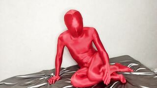Red zentai suit crushed by bulging penis case