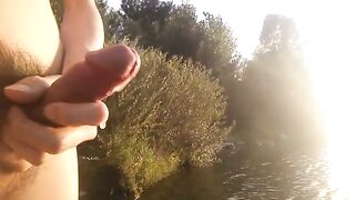 Twink wanks his hairy dick in public streams cum rivers