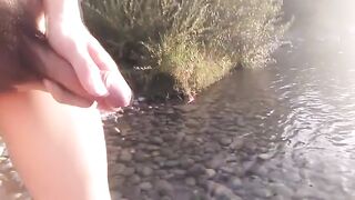 Twink wanks his hairy dick in public streams cum rivers