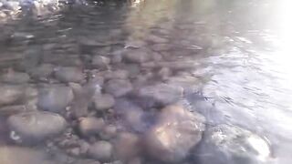 Twink wanks his hairy dick in public streams cum rivers