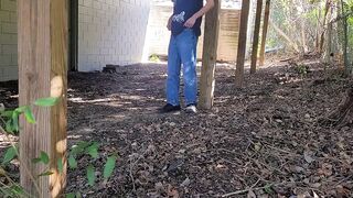 Twink jerks off in thong behind building