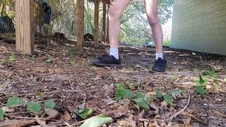 Twink jerks off in thong behind building