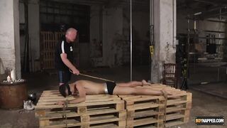Bound twink Axel Rubberax destroyed by daddy Sebastian Kane spanking slapping whipping