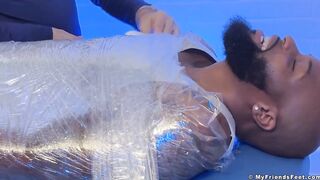 Hairy Dallas gets tickled raw by muscled feet while bound and stuffed