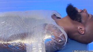 Hairy Dallas gets tickled raw by muscled feet while bound and stuffed
