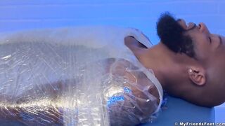Hairy Dallas gets tickled raw by muscled feet while bound and stuffed