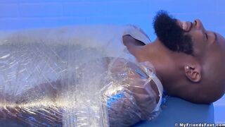 Hairy Dallas gets tickled raw by muscled feet while bound and stuffed
