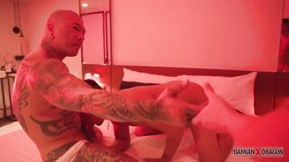Gay Asian threesome with Damian Dragon big dick double blowjob tattooed muscle