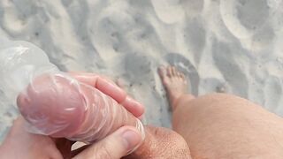 Twink boy at beach finds rampant condom and loads it fast
