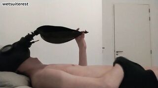 Gas masked femboy chokes on rebreather bag while jerking into his own underwear