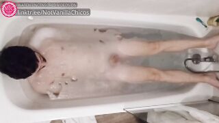 Soapy naked boy turns in bathtub getting steamy