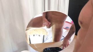 French bloke jerks off in mirror gushing cum all over his big cock and tattooed frame