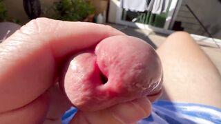 Big cock swinging while jerking off on public balcony spurting thick loads in tight underwear