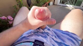 Big cock swinging while jerking off on public balcony spurting thick loads in tight underwear