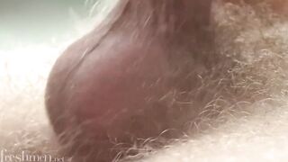 Cute blond twink jerks off with that uncut big cock till he blows a load