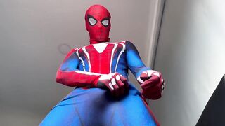 Horny Spiderman shoots thick ropes of gay cum on suit while edging handjob