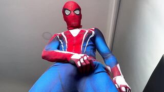 Horny Spiderman shoots thick ropes of gay cum on suit while edging handjob
